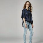 how do women wear football jerseys Woman wearing a football jersey styled with jeans